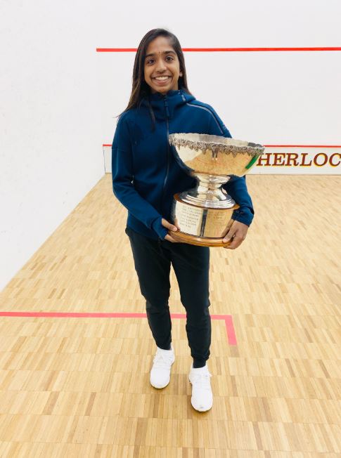 Proud girl with her trophy.